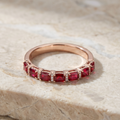 Gold ring with red crystal inlays